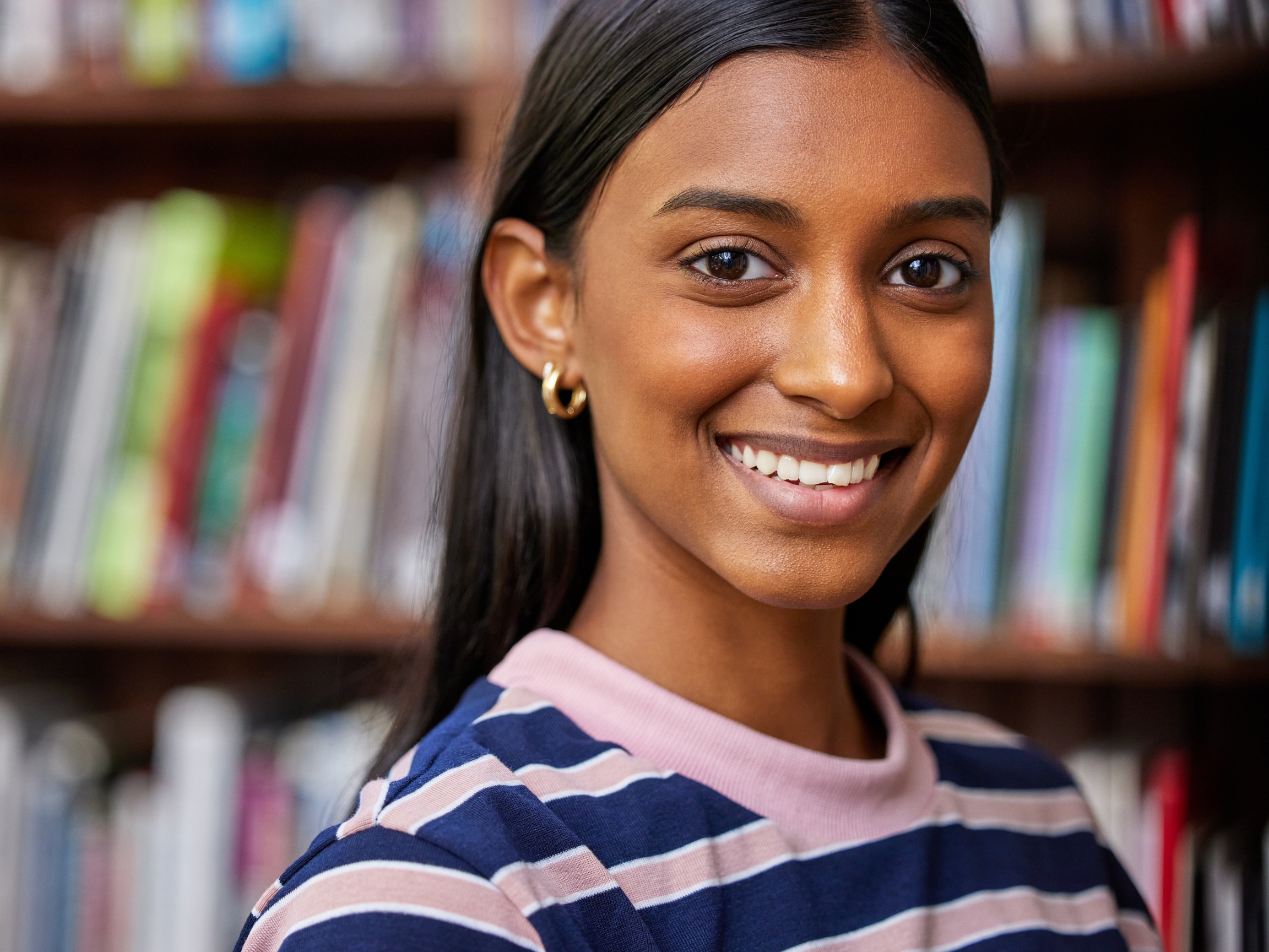 Indian student in library